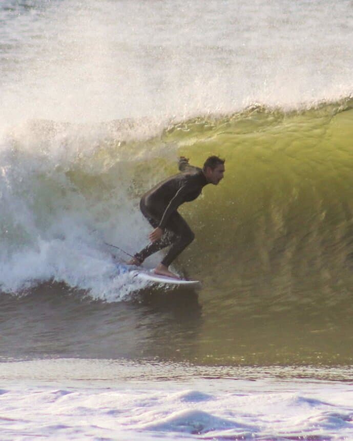Founder Andrew Kallinikos in a barrel